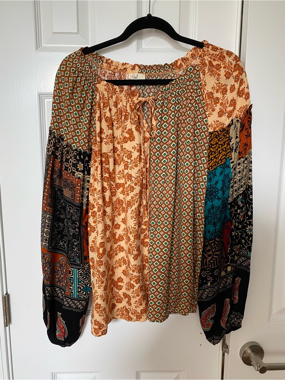 Fall colored women’s blouse size L generous cut.  Easel brand